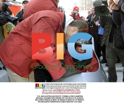 Michael Schumacher shows off skills to guests, including Prince Albert