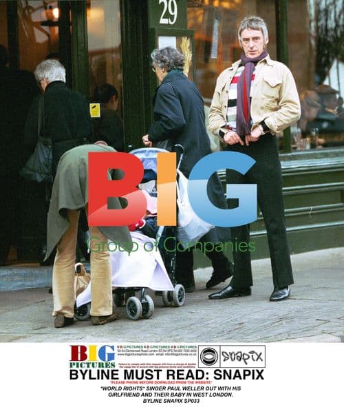 Paul Weller Out with Girlfriend and Baby