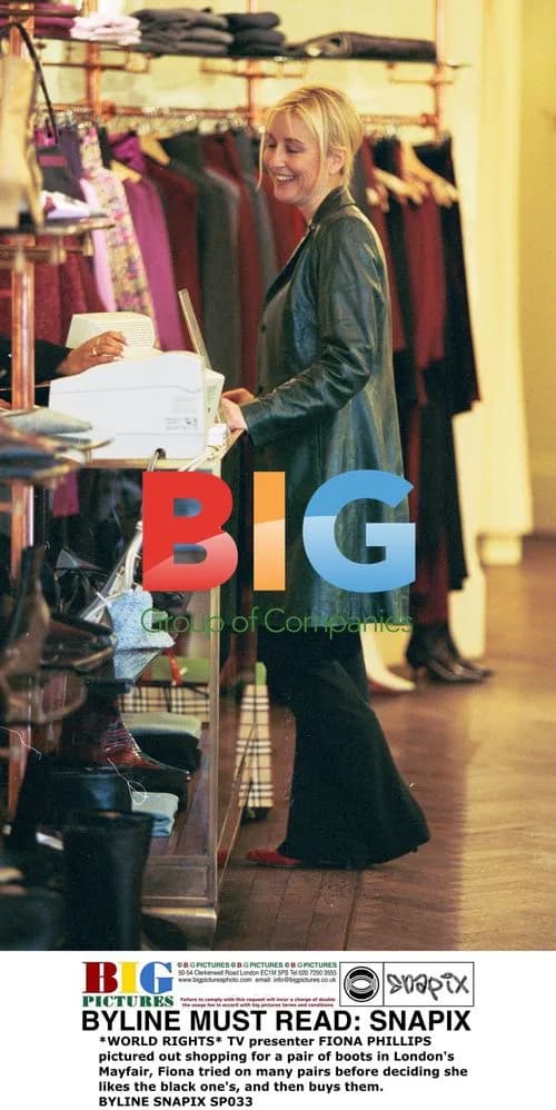 FIONA PHILLIPS shopping for boots in Mayfair