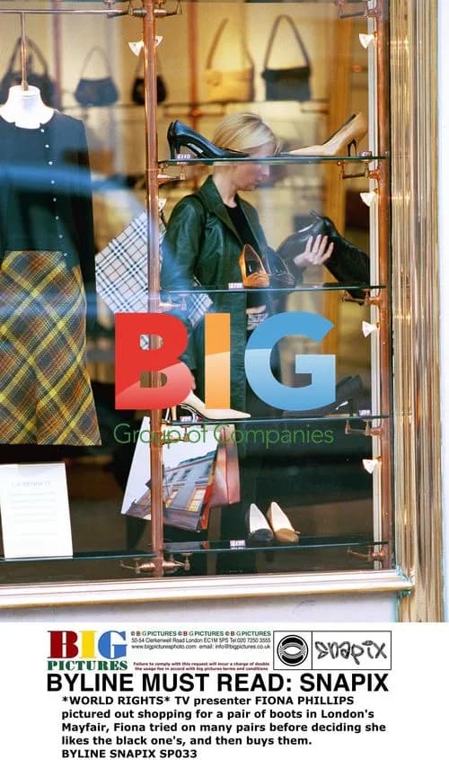 FIONA PHILLIPS shopping for boots in Mayfair