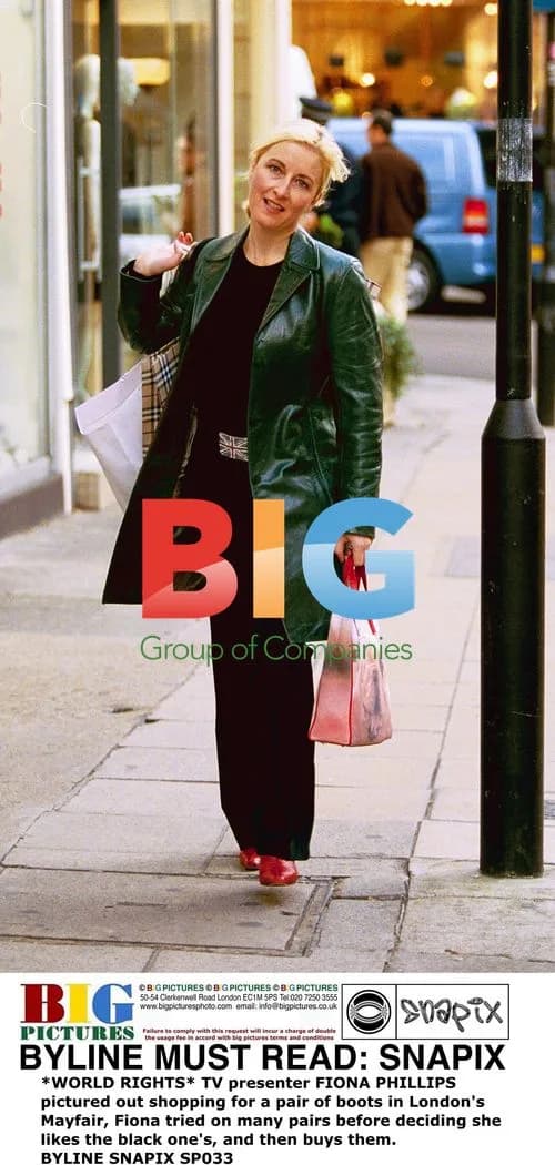 FIONA PHILLIPS shops for boots in Mayfair