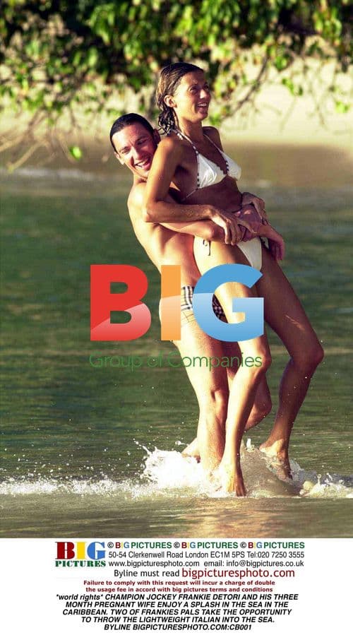 Frankie Dettori and pregnant wife at Caribbean beach