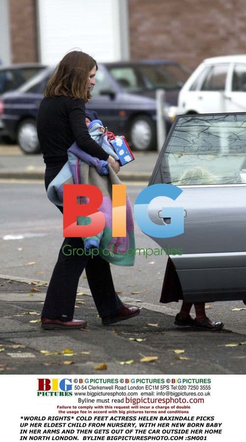 Helen Baxindale picks up child
