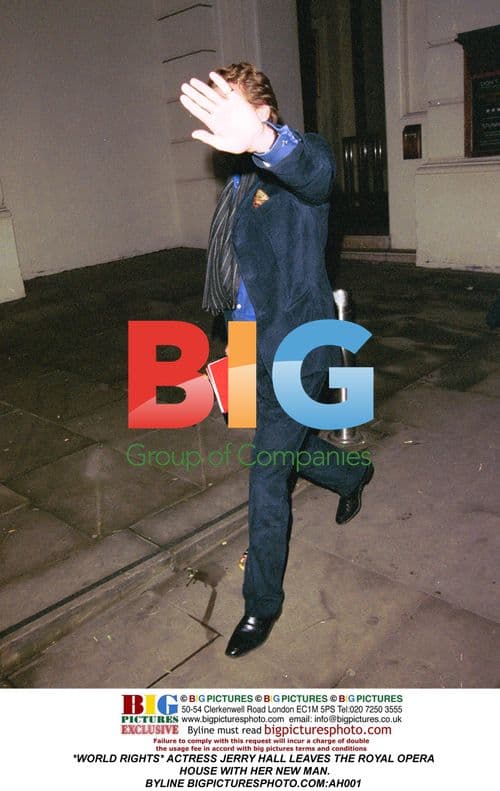 Jerry Hall leaves Royal Opera House with new man