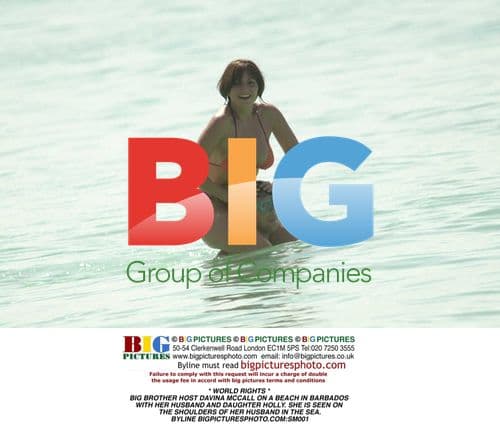 Davina McCall Plays in the Sea with Family