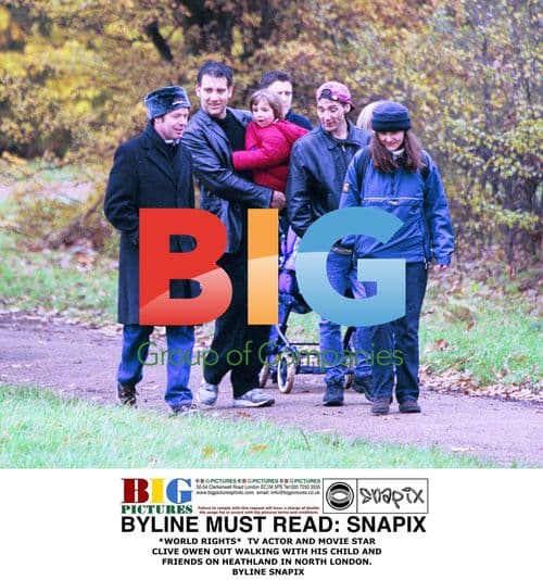 Clive Owen with child and friends in London