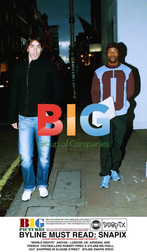 Arsenal players Pires & Wilthall shopping in London