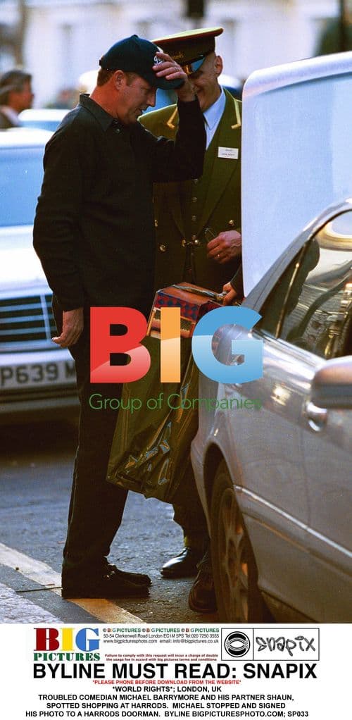 Michael Barrymore and Partner Spotted Shopping at Harrods