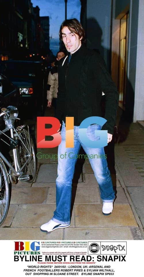 Arsenal footballers Pires & Wilthall out shopping