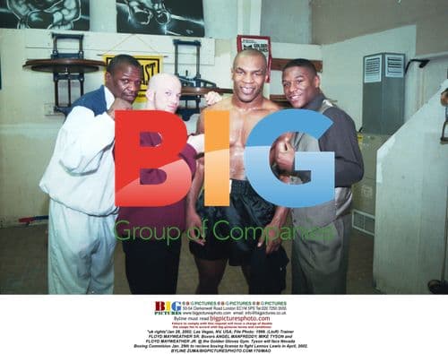 Tyson, Mayweather Sr. and Jr. at Golden Gloves Gym