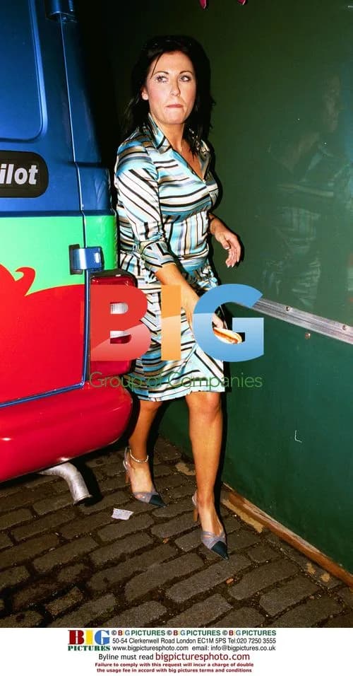 Jessie Wallace Grabs Hot Dog at 'Scooby Doo' Party