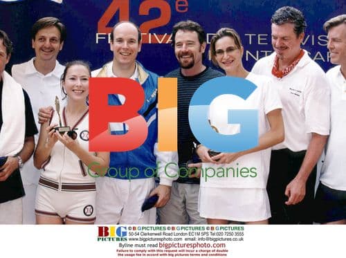 Prince Albert of Monaco and Alexandra Kamp play tennis