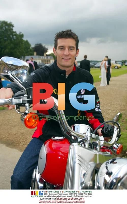Mark Webber arrives at Drivers' Ball on motorbike