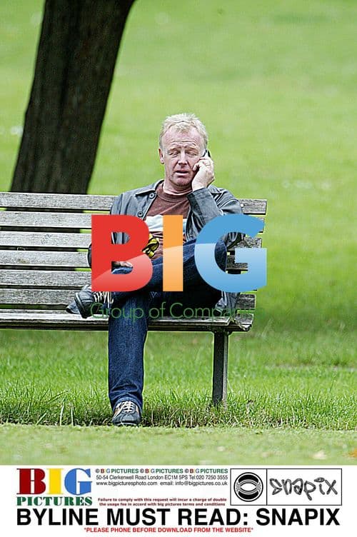 Les Dennis Walking Dogs in Park