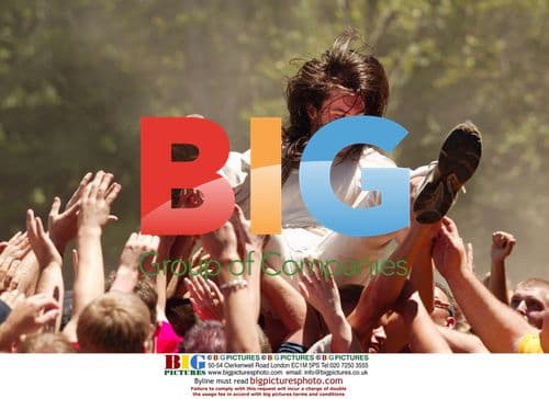 Andrew W.K. crowd surfs at Ozzfest 2002