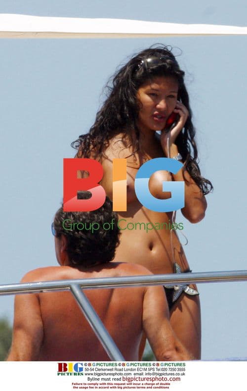 FLAVIO BRIATORE AND GIRLFRIEND IN SARDINIA