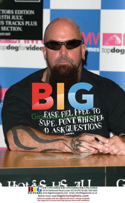 SLAYER band members sign CD 'God Hates Us All'