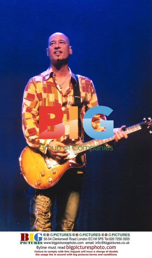 Guitarist Jimmy Stafford of Train performs at Merriweather Post