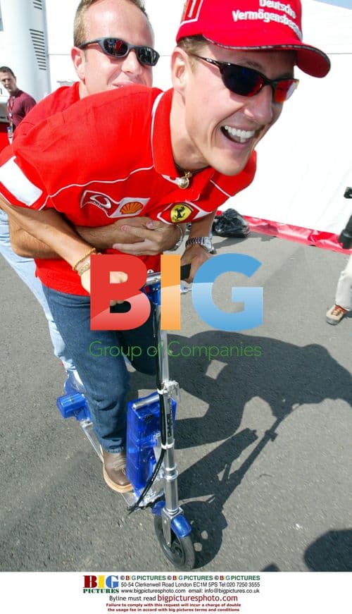Schumacher and Barrichello on Motorized Scooter