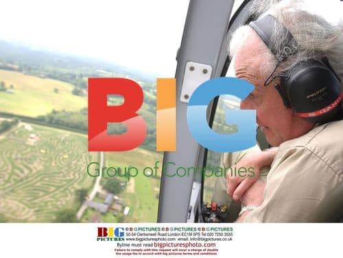 David Sheperd looks out helicopter at tiger maze