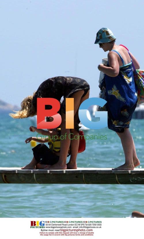 Jerry Hall and son arrive at beach club