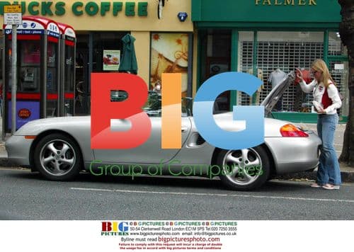 Actress Jo Taylor showing off England kit