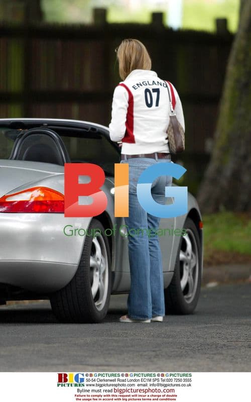Actress Jo Taylor shows off England top