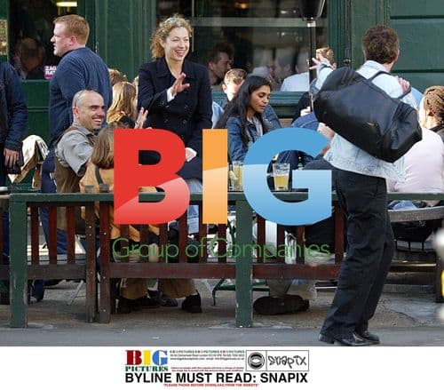 Alex Kingston enjoys drink with friends in London