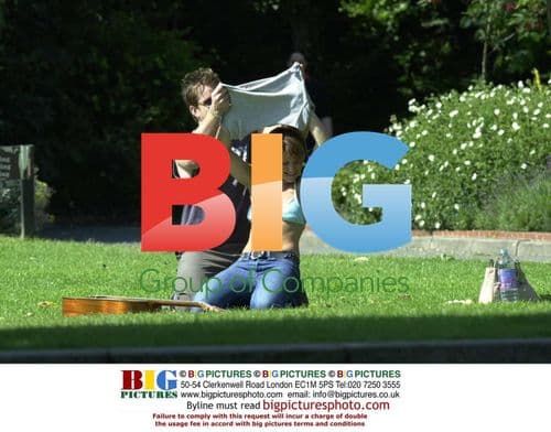 Harriet Scott and boyfriend John O'Mahoney out in London