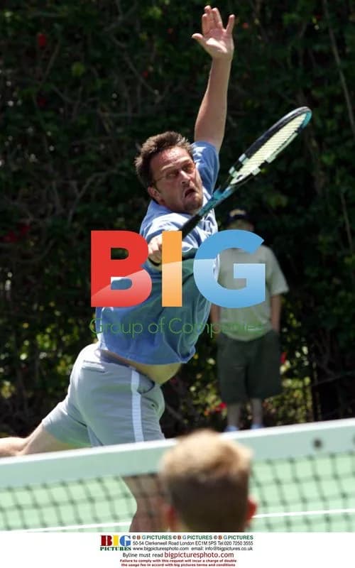 Matthew Perry playing tennis at Playboy Mansion