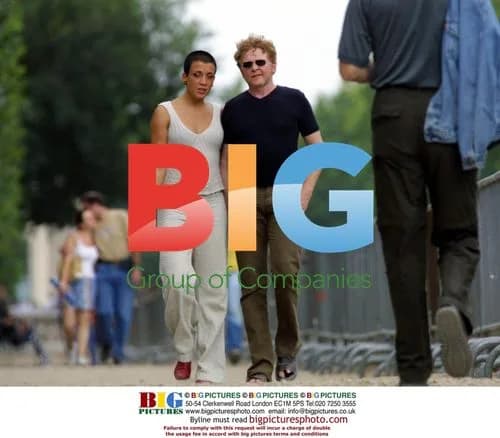 Mick Hucknall and girlfriend in Paris