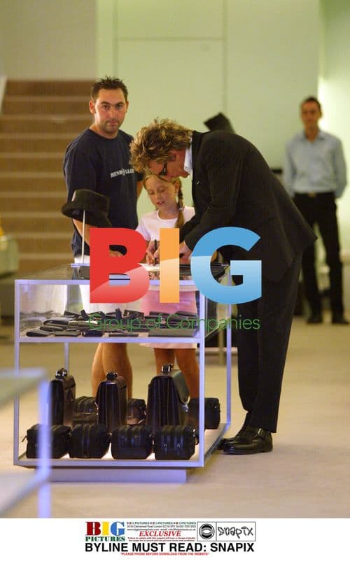 Rod Stewart and Penny Lancaster Shop at Prada