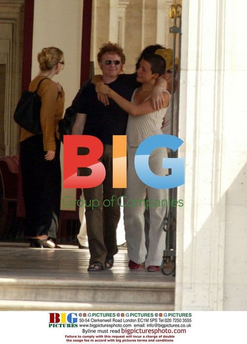 Mick Hucknall and girlfriend in Paris