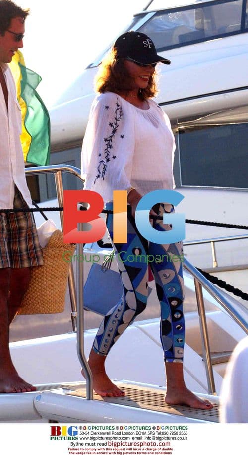 Joan Collins and Husband Percy Gibbons on Yacht