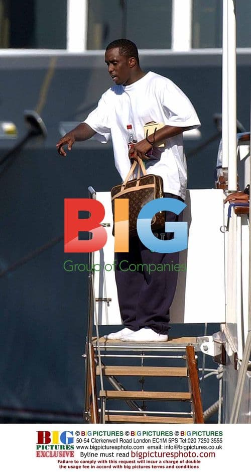 P Diddy Arrives with Louis Vuitton Luggage in St Tropez