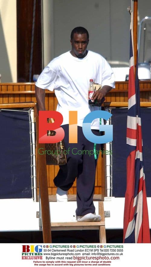 P Diddy arrives with Louis Vuitton luggage in St Tropez