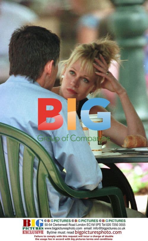 Melanie Griffith and Gabriel Byrnes strolling in Hollywood