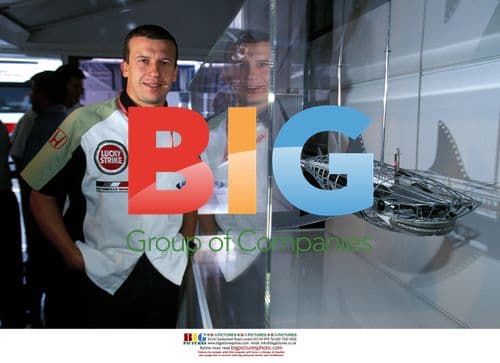 Olivier Panis Examines Sculpture at German GP