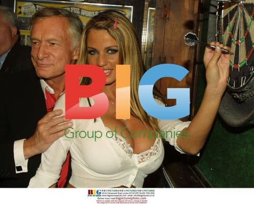 Jordan and Hugh Hefner play darts