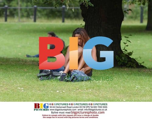 EastEnders Star Judi Shekoni Relaxing in London Park