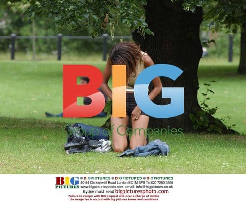 Judi Shekoni relaxes in West London park