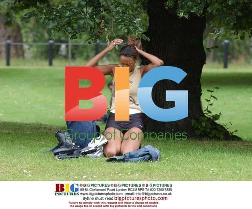 Judi Shekoni relaxing in London park