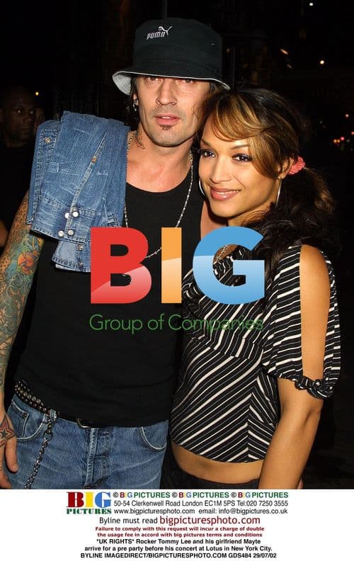 Tommy Lee and Mayte arrive for pre-concert party