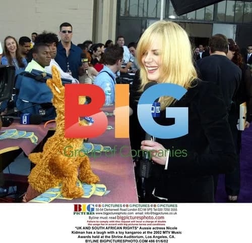 Nicole Kidman laughs with toy kangaroo at 2002 MTV Awards