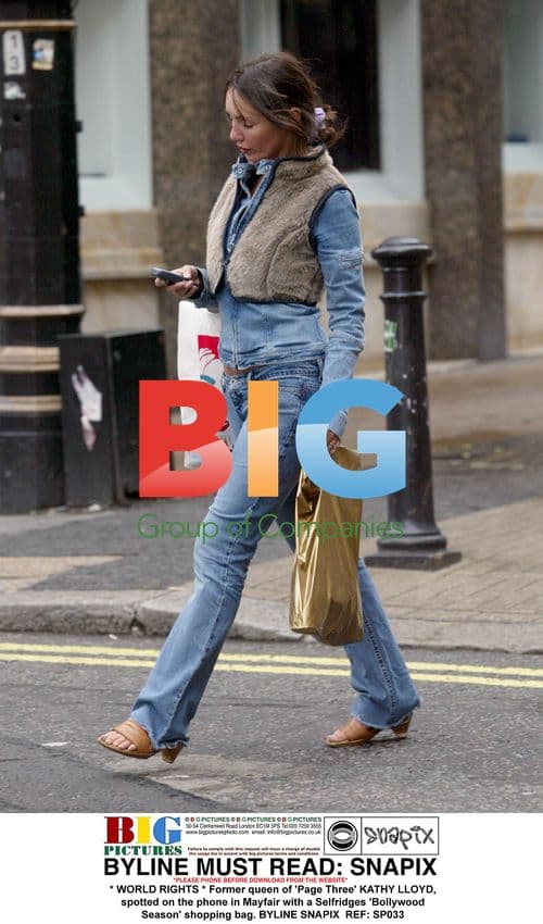 Kathy Lloyd shopping in Mayfair