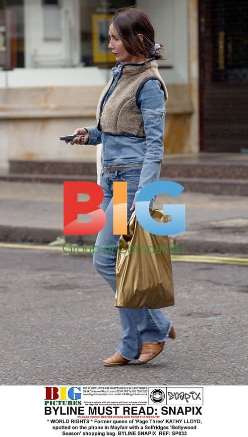 Kathy Lloyd shopping in Mayfair