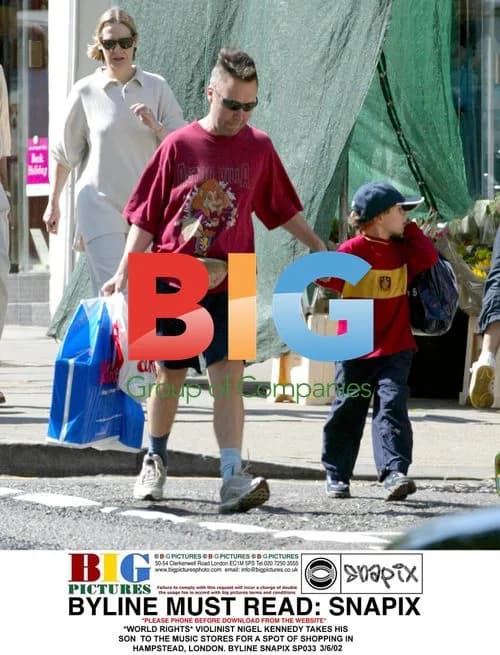Violinist Nigel Kennedy and Son Shopping