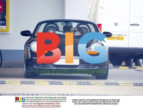 EastEnders Stars Michelle Ryan and Gary Lucy Kiss in Car