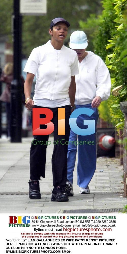 Patsy Kensit exercises with trainer