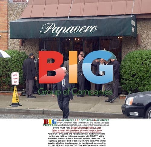 Guests and flowers at John Gotti's wake